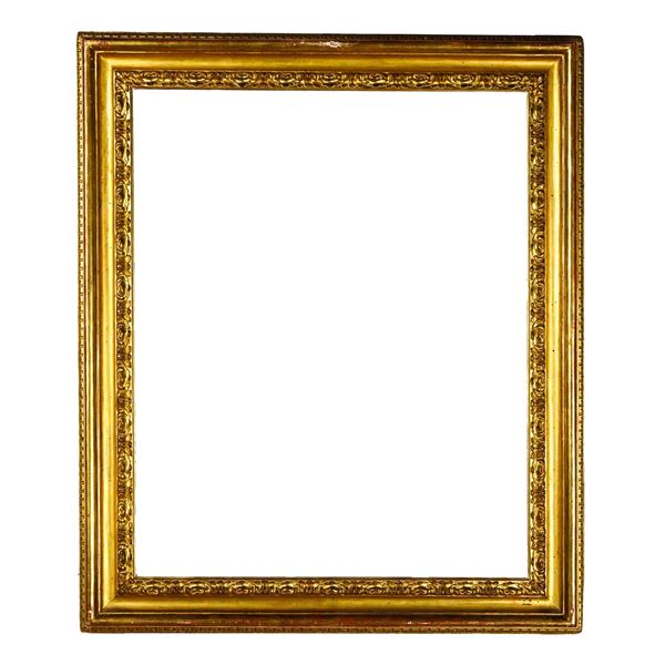 Coppia di cornici in legno intagliato e dorato. Italia centrale XVIII secolo