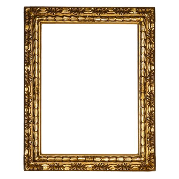 Cornice in legno intagliato e dorato. Italia XVIII secolo