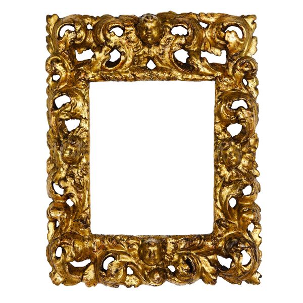 Cornice barocca in legno intagliato e dorato. Italia XVII secolo