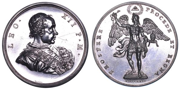STATO PONTIFICIO. LEONE XII (Annibale Sermattei della Genga), 1823-1829. Medaglia annuale in argento 1824 (A. II). Visita del Pontefice all'Ospizio di San Michele.