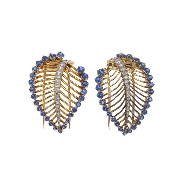 Pair of sapphire, diamond and gold clips. Signed Faraone. Fitted case