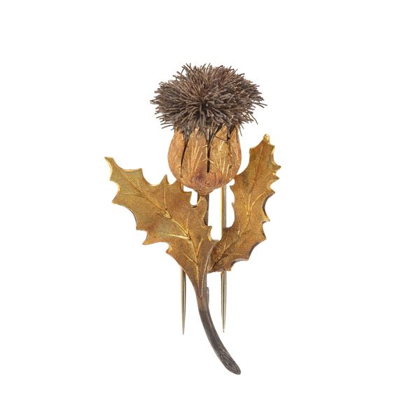 Gold and silver brooch. Signed M. Buccellati. Fitted case