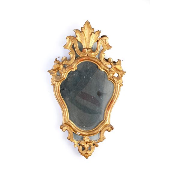 Cornice in legno intagliato e dorato. XVIII-XIX secolo