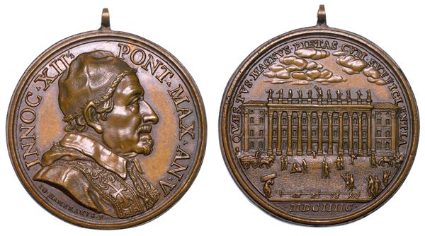 STATO PONTIFICIO. INNOCENZO XII (Antonio Pignatelli), 1691–1700. Medaglia annuale in bronzo 1696/A. V. La Dogana di Terra in piazza di Pietra.