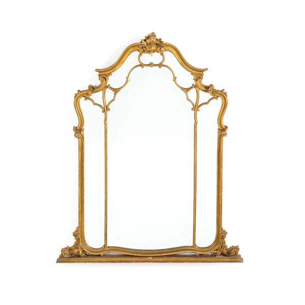 Specchiera da comò in legno intagliato. XX secolo