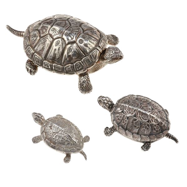 Three silver "tortoise" holder. Signed M. Buccellati