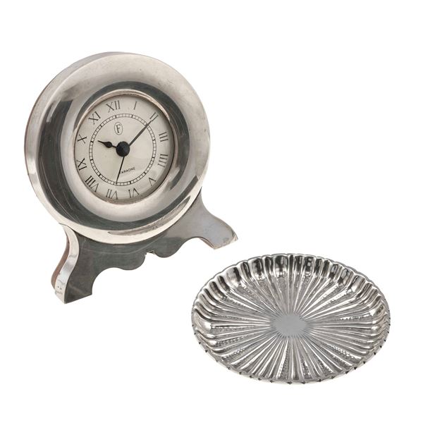 One silver plate and one table clock. Signed Faraone. The table clock's movement has not been tested for the accuracy of time and may need a service