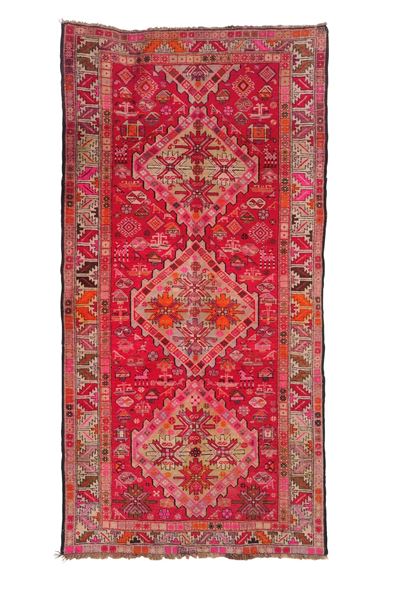 Tappeto Caucasico, inizio XX secolo, dimensioni 285x226 cm