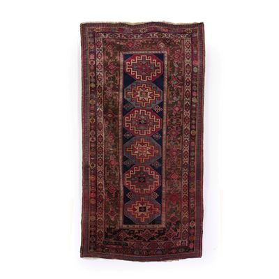 Tappeto Caucasico, fine XIX secolo, cm 300x145