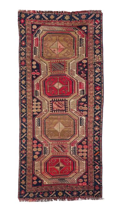 Tappeto Caucasico, inizio XX secolo, cm 264 x 109