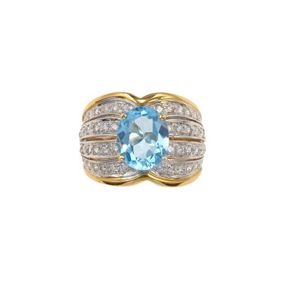 Anello in oro giallo e bianco 750/1000 con topazio azzurro e diamanti