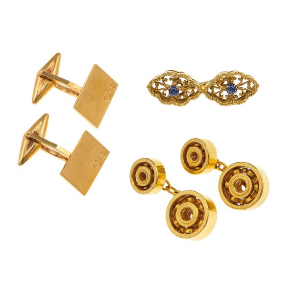 Group of two pair of gold cufflinks and one single gold cufflink