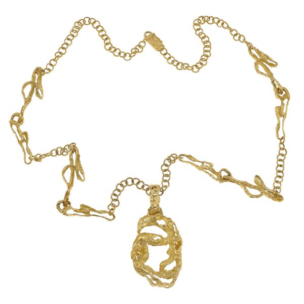 Gold long chain with pendant. Signed Sforza