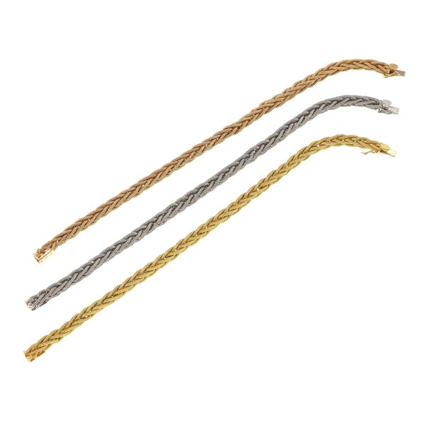 Three gold bracelets