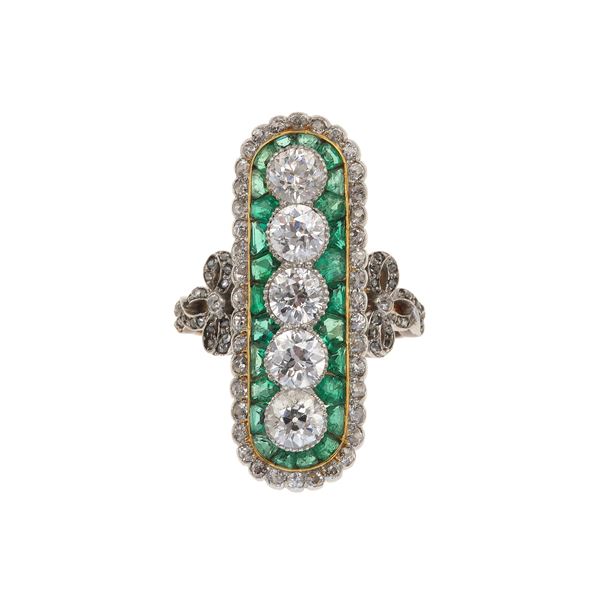 Diamond, emerald, gold and silver ring