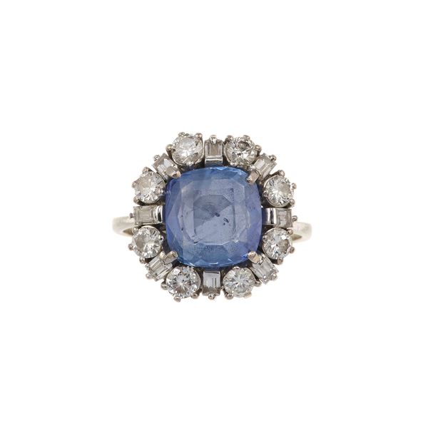 Sri Lanka sapphire weighing 3.40 carats approx. and diamond ring. No indication of heating