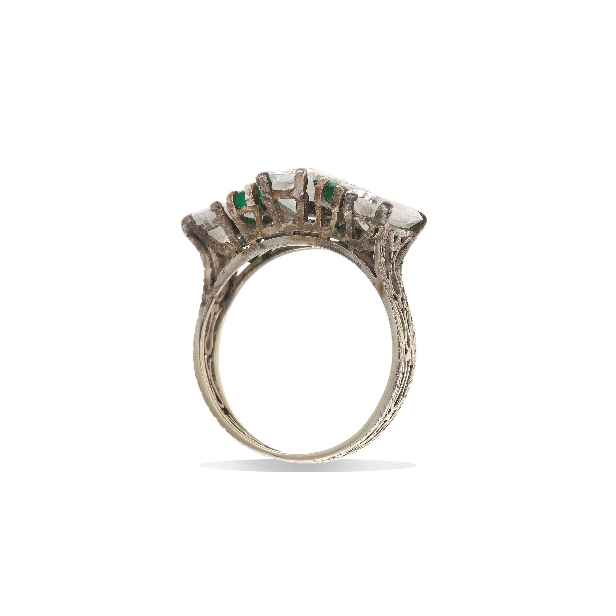 Anello con Tre Diamanti Taglio Smeraldo di Ct 0.75, 1.00 e 0.75 Circa e Due Smeraldi
