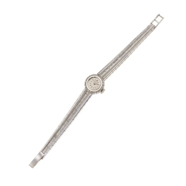 Diamond and 14Kt gold lady's wristwatch. Signed and numbered Universal Genève n. 1856541765158. The watch’s movement have not been tested for the accuracy of time and may need a service