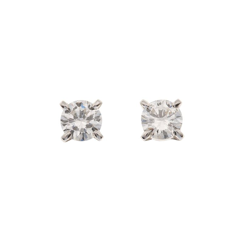 Pair of brilliant-cut diamond weighing 0.721 and 0.727, color G, clarity VS1 and VVS2, fluorescence none. Gemmological Report SSEF n. CH 11609 and CH 11600 year 2002  - Auction Fine Jewellery - Cambi Casa d'Aste