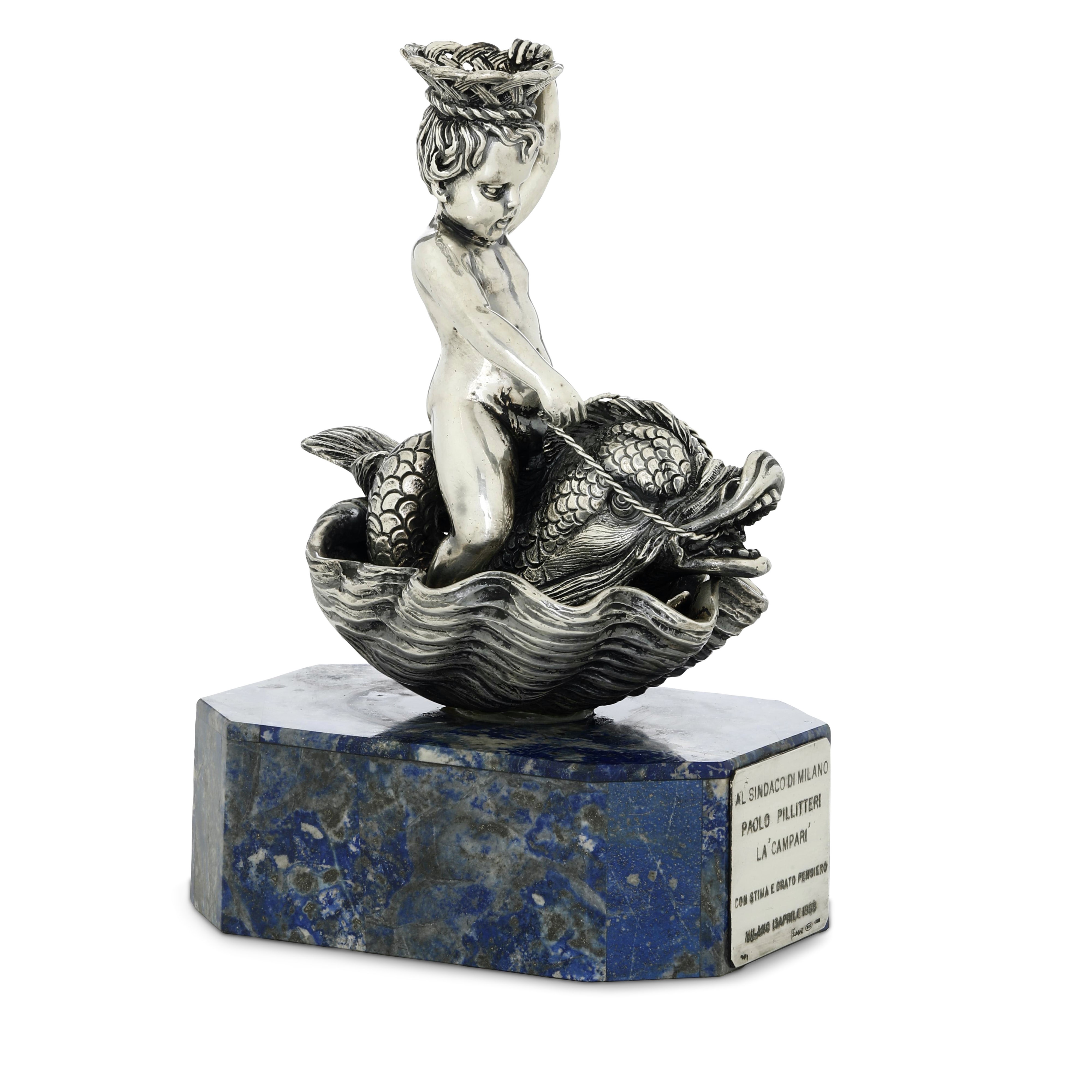 Putto su Tritone e Conchiglia. Argenteria Artistica Milanese del XX Secolo. Argentiere Valvassori...