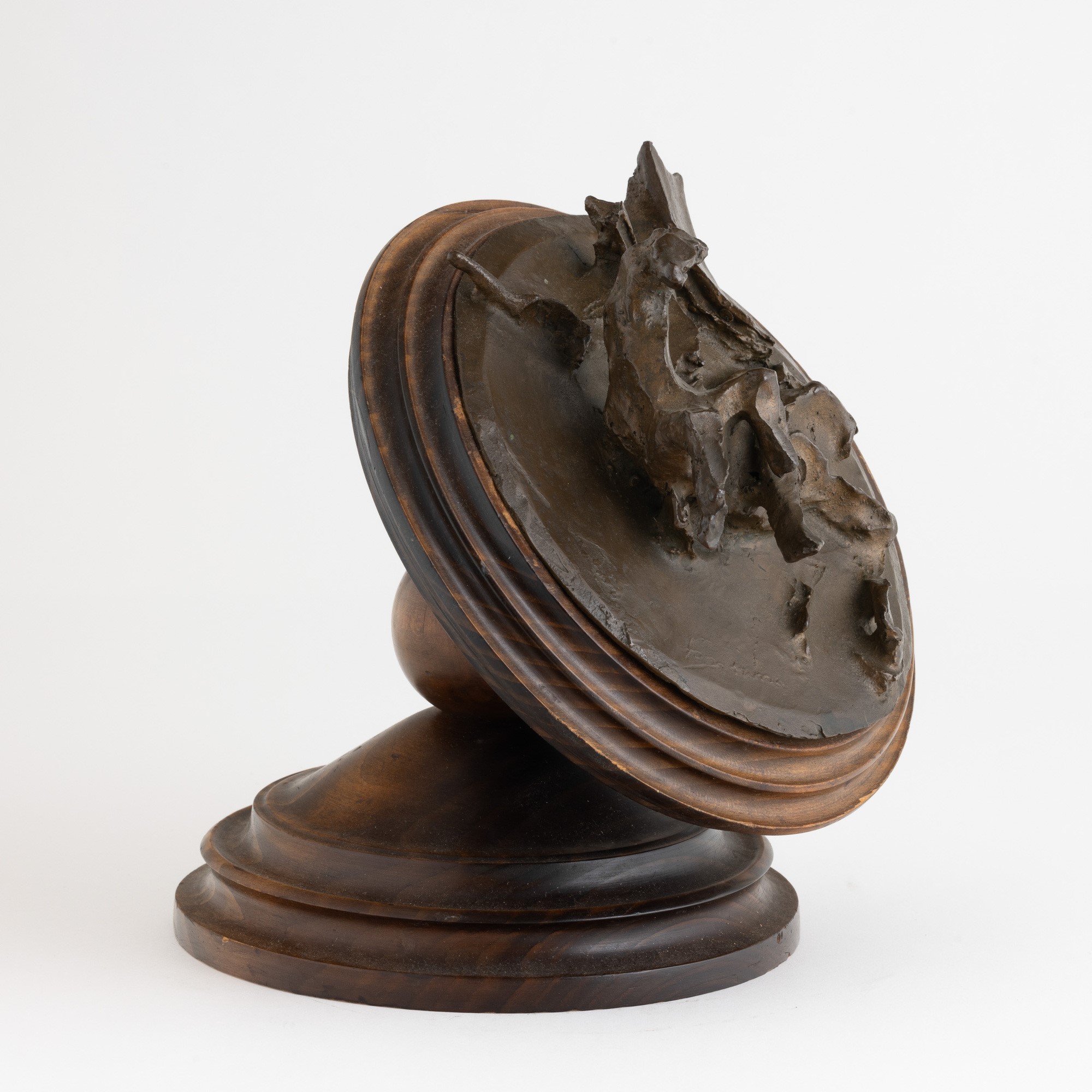 Lucio Fontana - Piastra in bronzo su supporto in legno