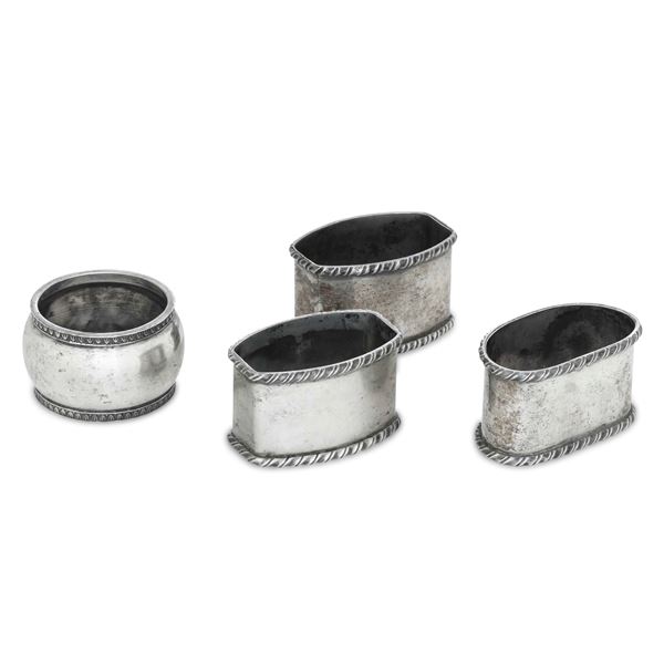 Quattro portatovaglioli diversi. Diverse argenterie italiane del XX secolo