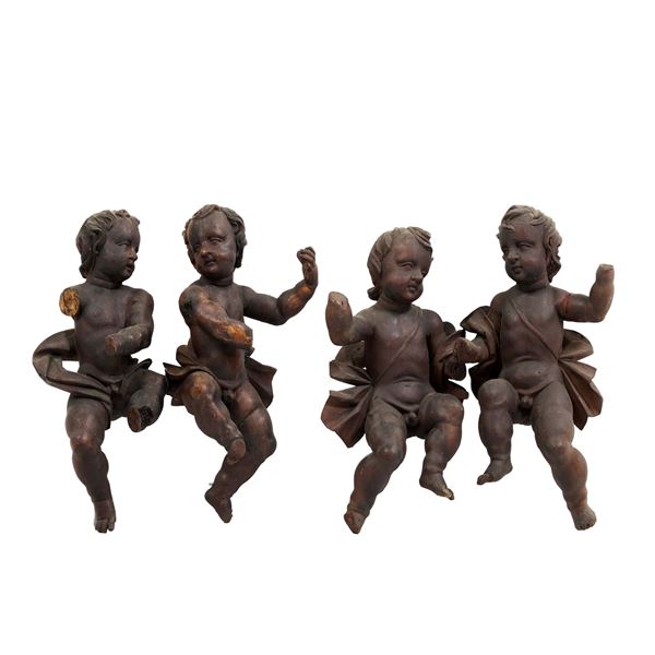 Scultore del XX secolo Quattro putti
