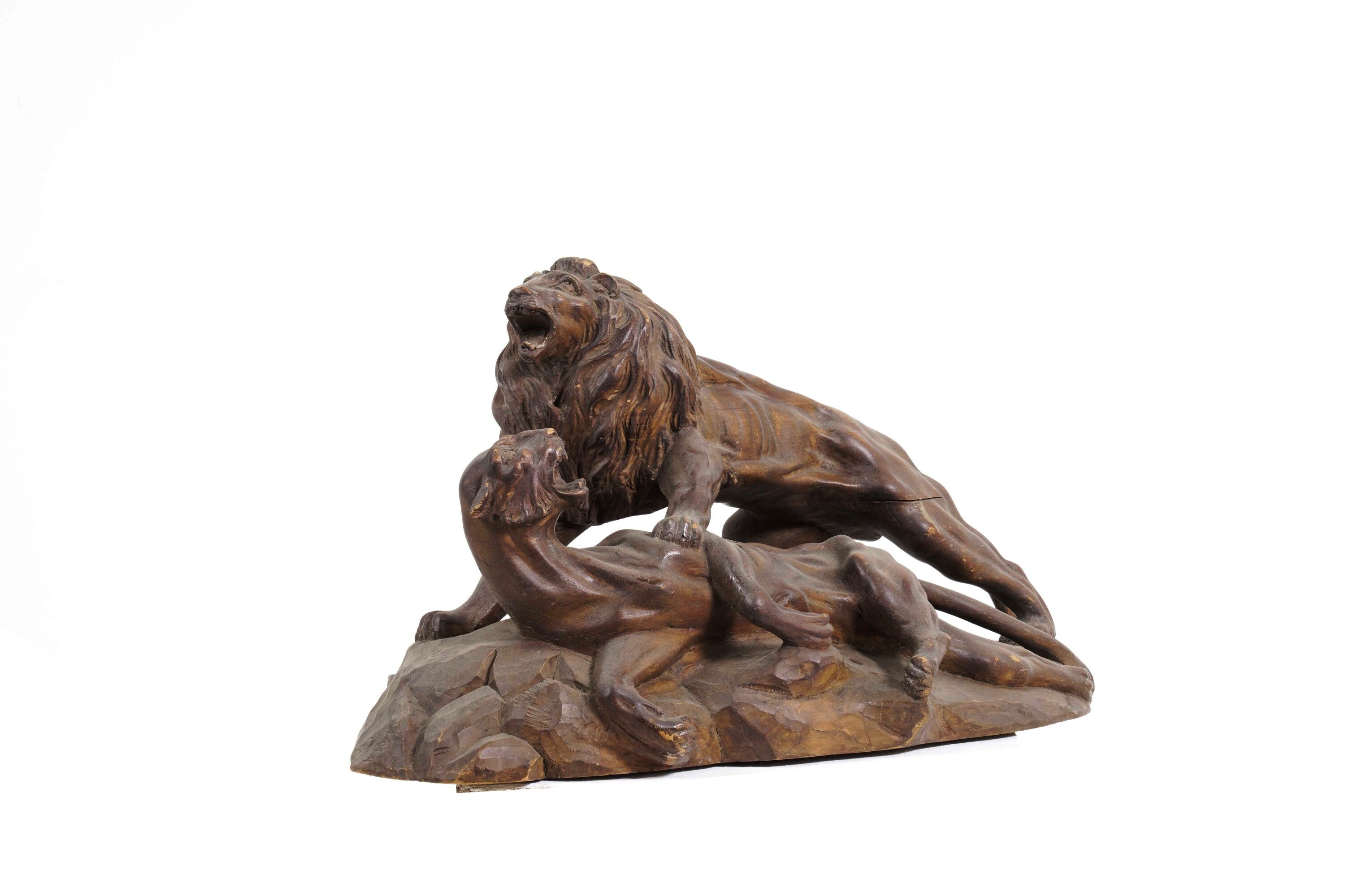 Scultore del XX secolo, Leone e leonessa, scultura in legno
