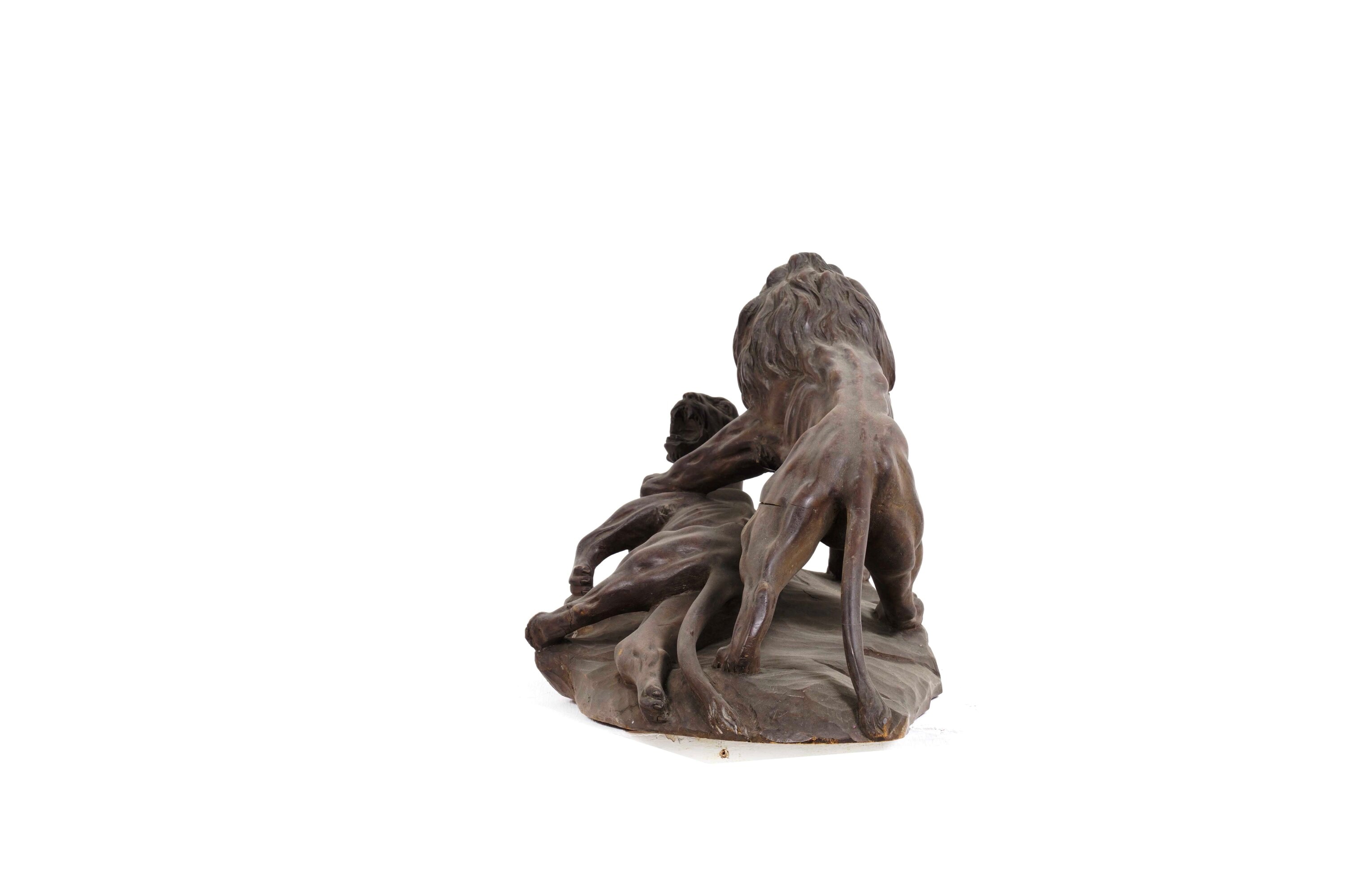 Scultore del XX secolo, Leone e leonessa, scultura in legno