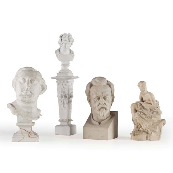 Tre busti e una figura femminile in porcellana e gesso