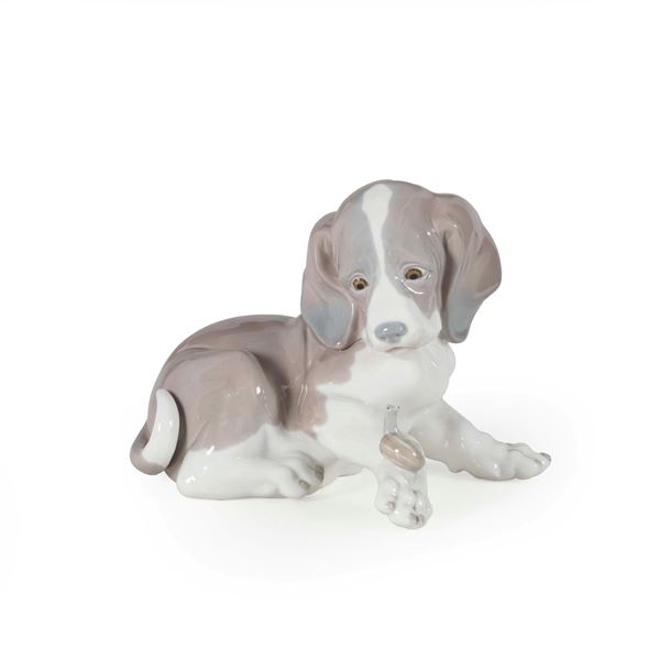 Figura di cane con chiocciola. Spagna, Tavernes Blanques (Valencia), Manifattura Lladro, XX secolo.