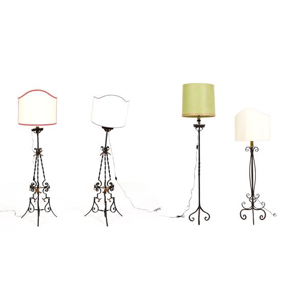 Quattro diverse piantane in ferro battuto