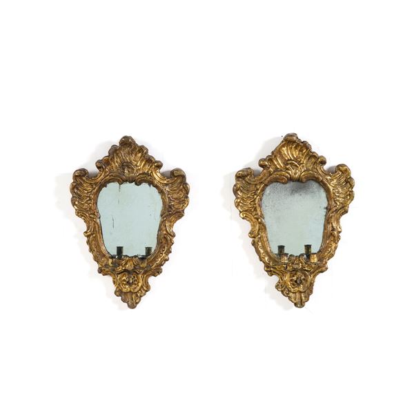 Coppia di ventoline in legno intagliato e dorato. XVIII-XIX secolo