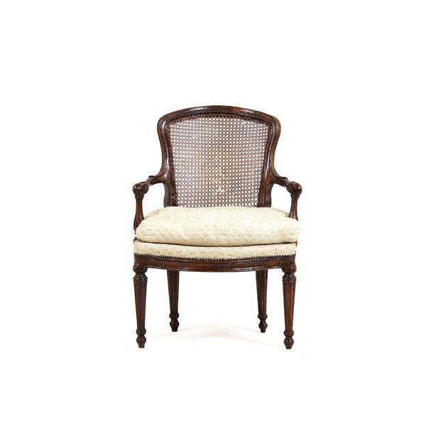 Poltrona Luigi XVI in legno intagliato. XVIII secolo