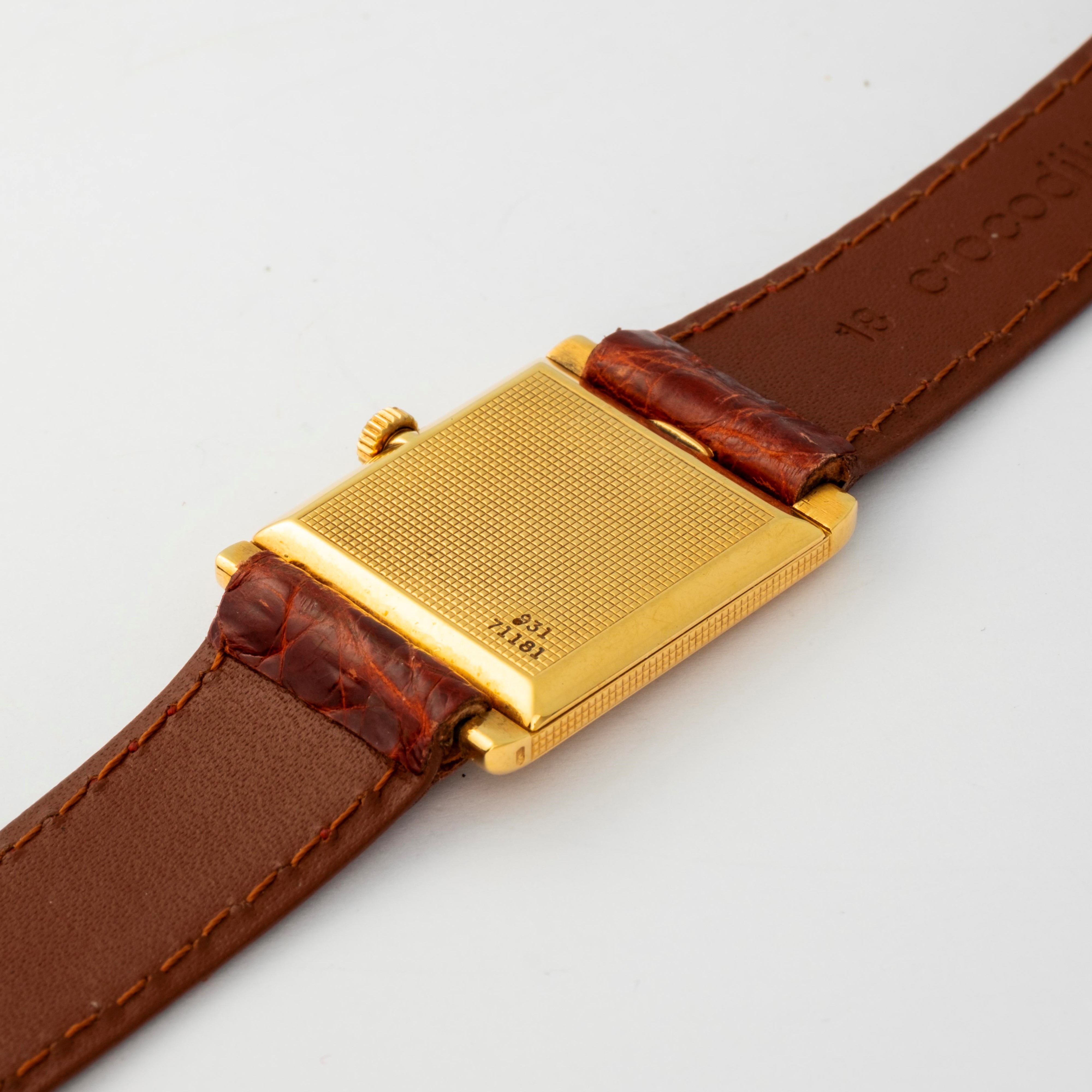 Piaget - Orologio da polso modello Tank in oro giallo 18k con quadrante champagne Clous de Paris,...