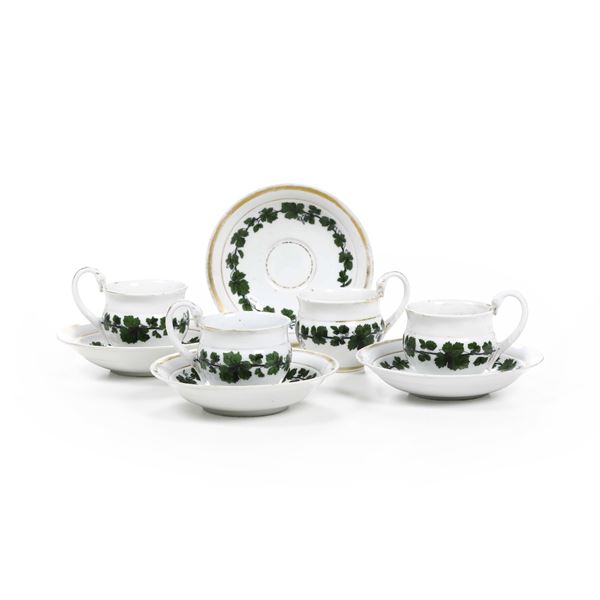 Quattro tazze con piattino. Meissen, XIX secolo.