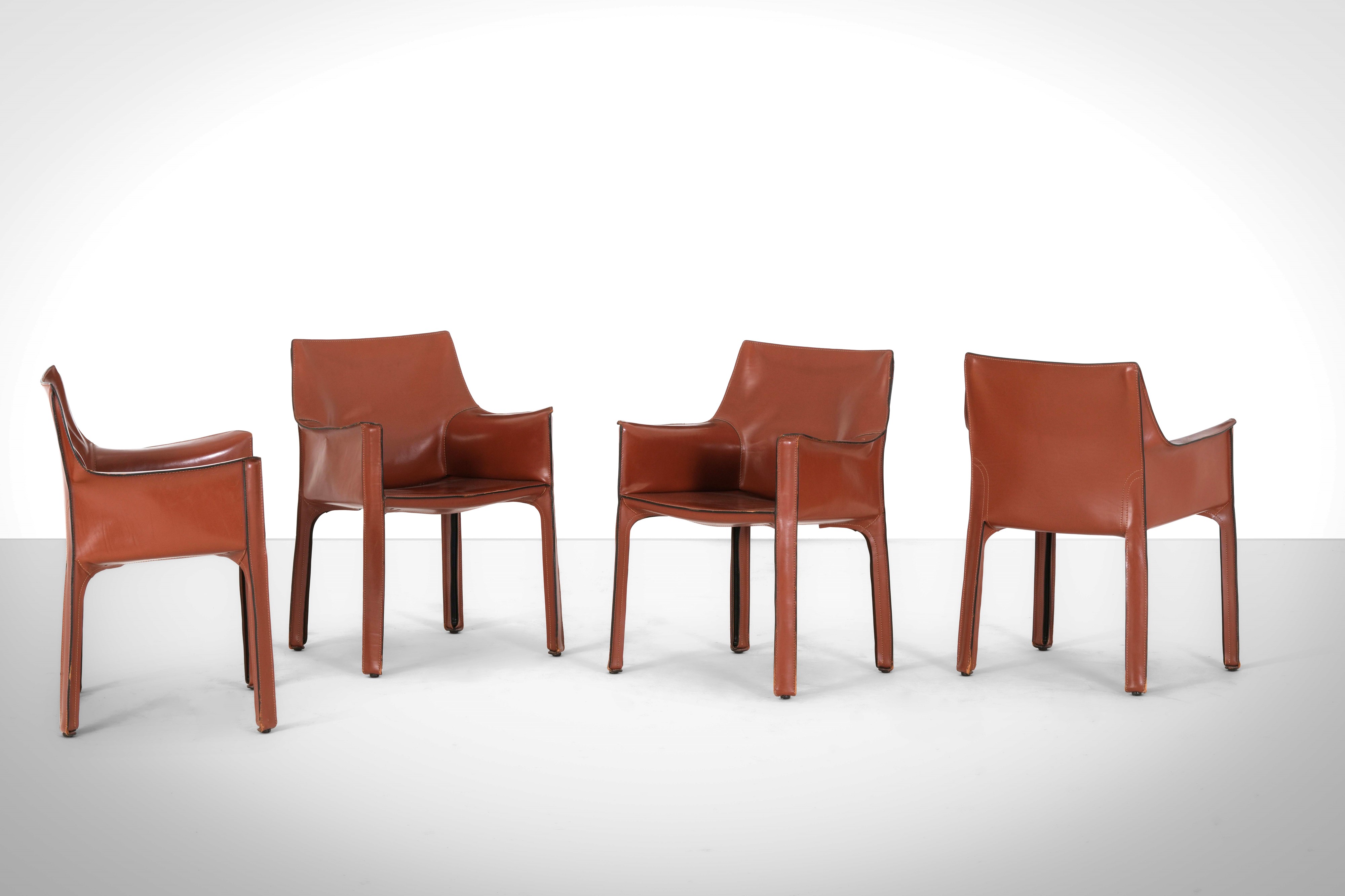 Mario Bellini - Poltroncine mod. Cab 413, struttura in materiale plastico e rivestimento in cuoio