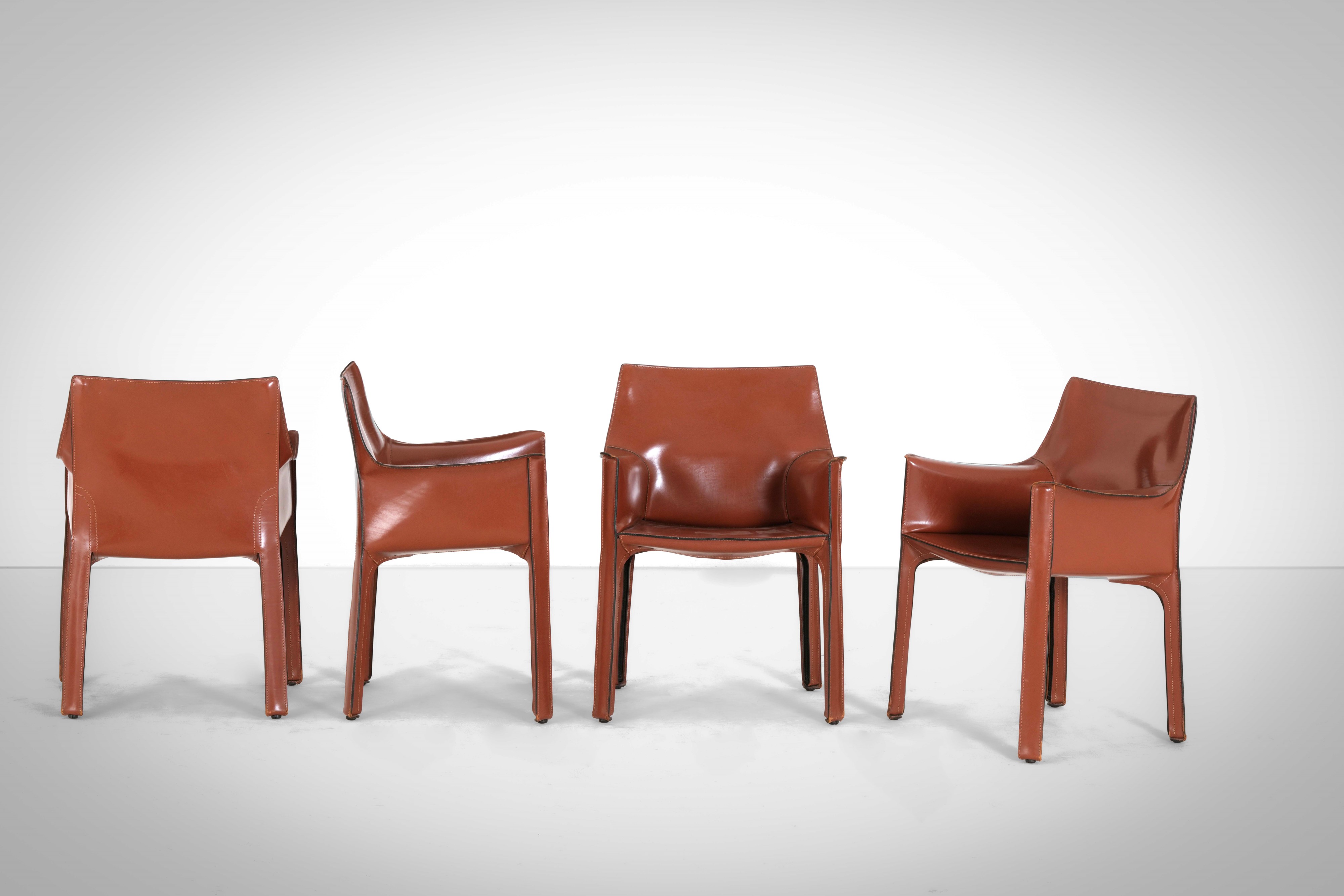 Mario Bellini - Poltroncine mod. Cab 413, struttura in materiale plastico e rivestimento in cuoio