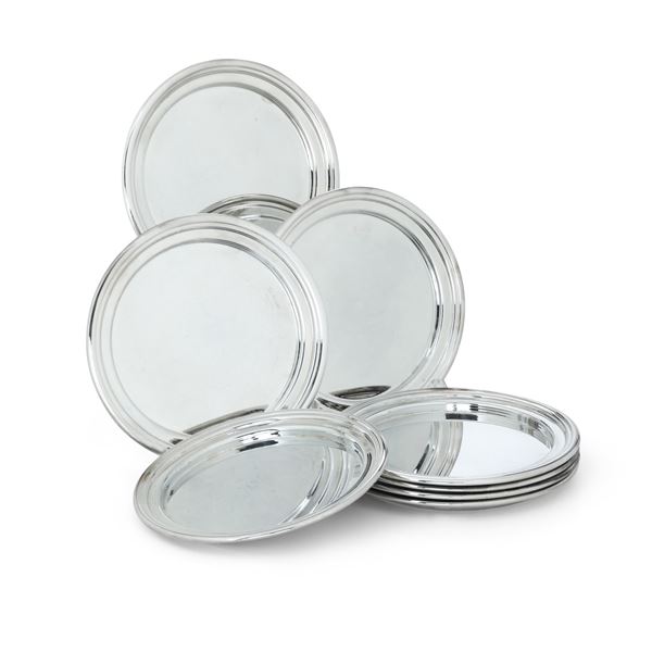 Otto piattini porta pane in metallo argentato. Cassetti, Firenze