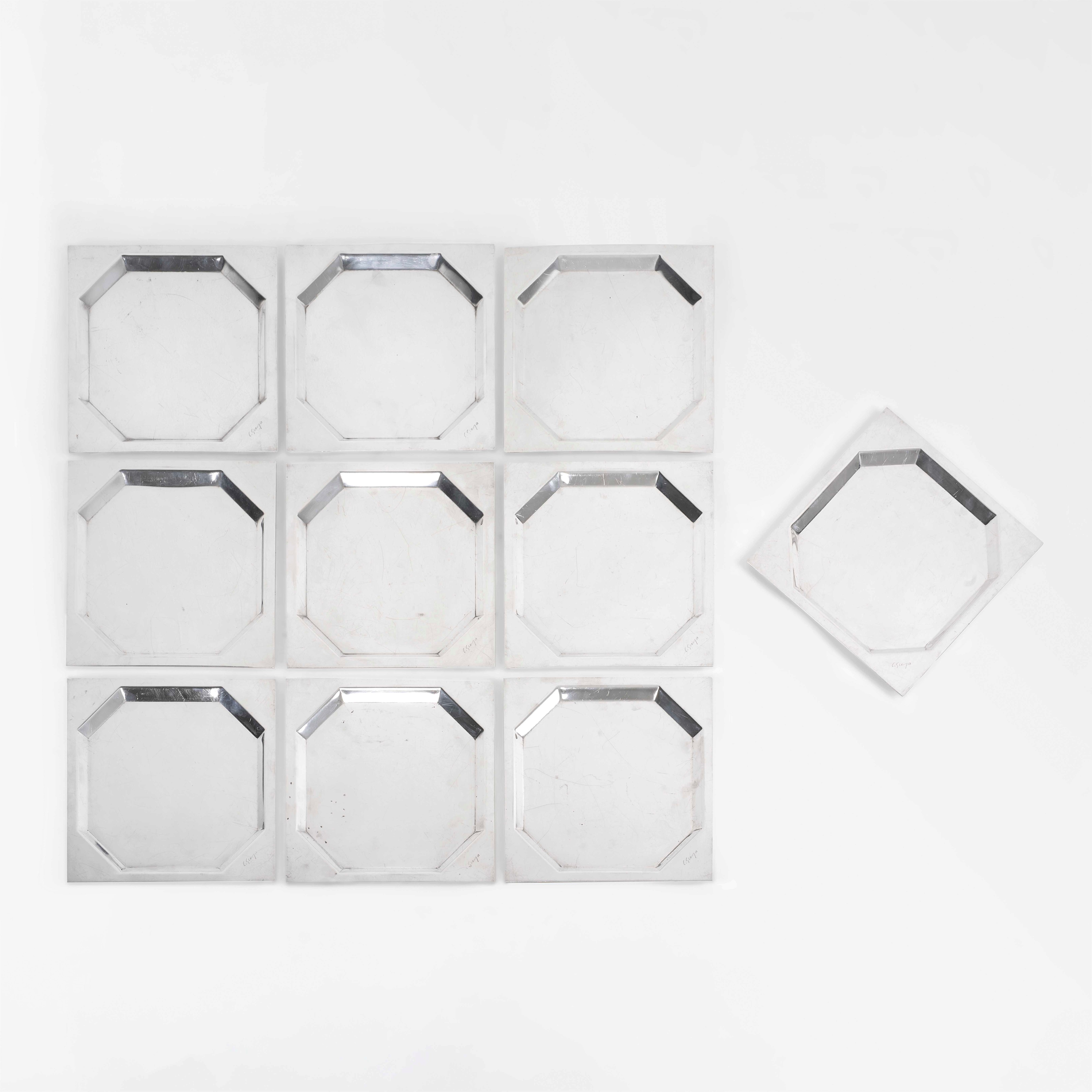 Carlo Scarpa - Dieci Sottopiatti in Argento 925.