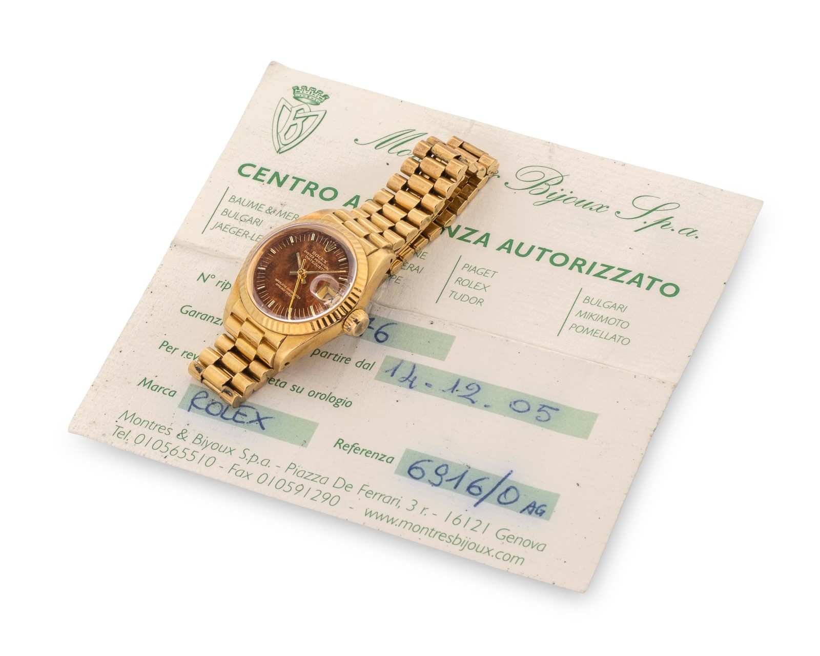 Rolex - Oyster Perpetual Lady Datejust ref 6917/8, oro giallo con quadrante in radica, circa 1980