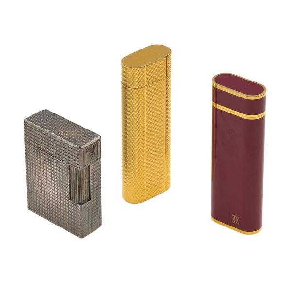 Due accendini Cartier ed un accendino Dupont