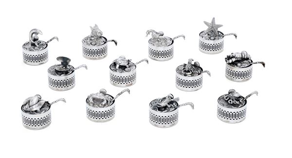 Dodici saliere segnaposto a soggetto marinaro. Argenteria artistica milanese del XX secolo, argentiere FIAM per Faccioli