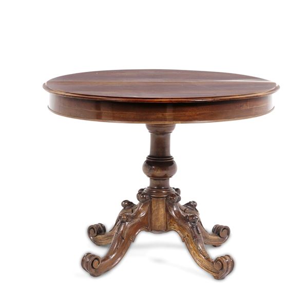 Tavolo tondo allungabile in mogano. Fine del XIX secolo