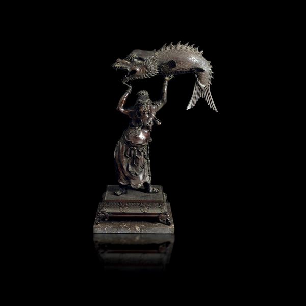 Figure of a sage holding an aquatic animal, bronze, Japan, 19th century