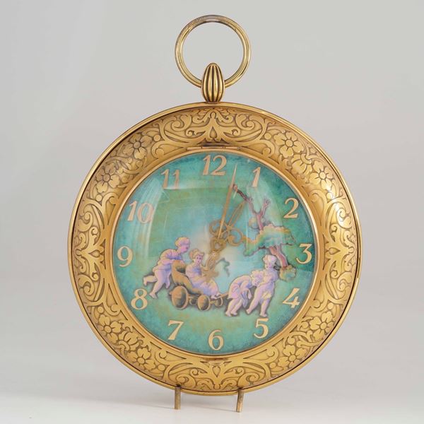 Orologio da carrozza in metallo dorato
