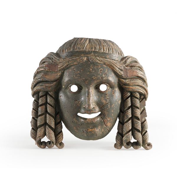 Maschera da teatro in legno patinato. XIX secolo