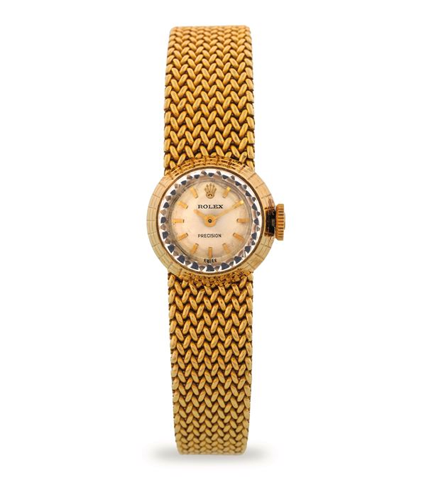 Rolex - Chameleon ref 2025 in 18k yellow gold with removable bracelet, silver-plated dial, circa 1960
