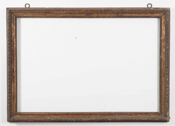 Grande cornice in legno intagliato. XVIII secolo