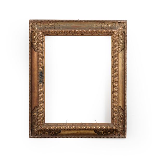 Cornice in legno intagliato. XIX secolo